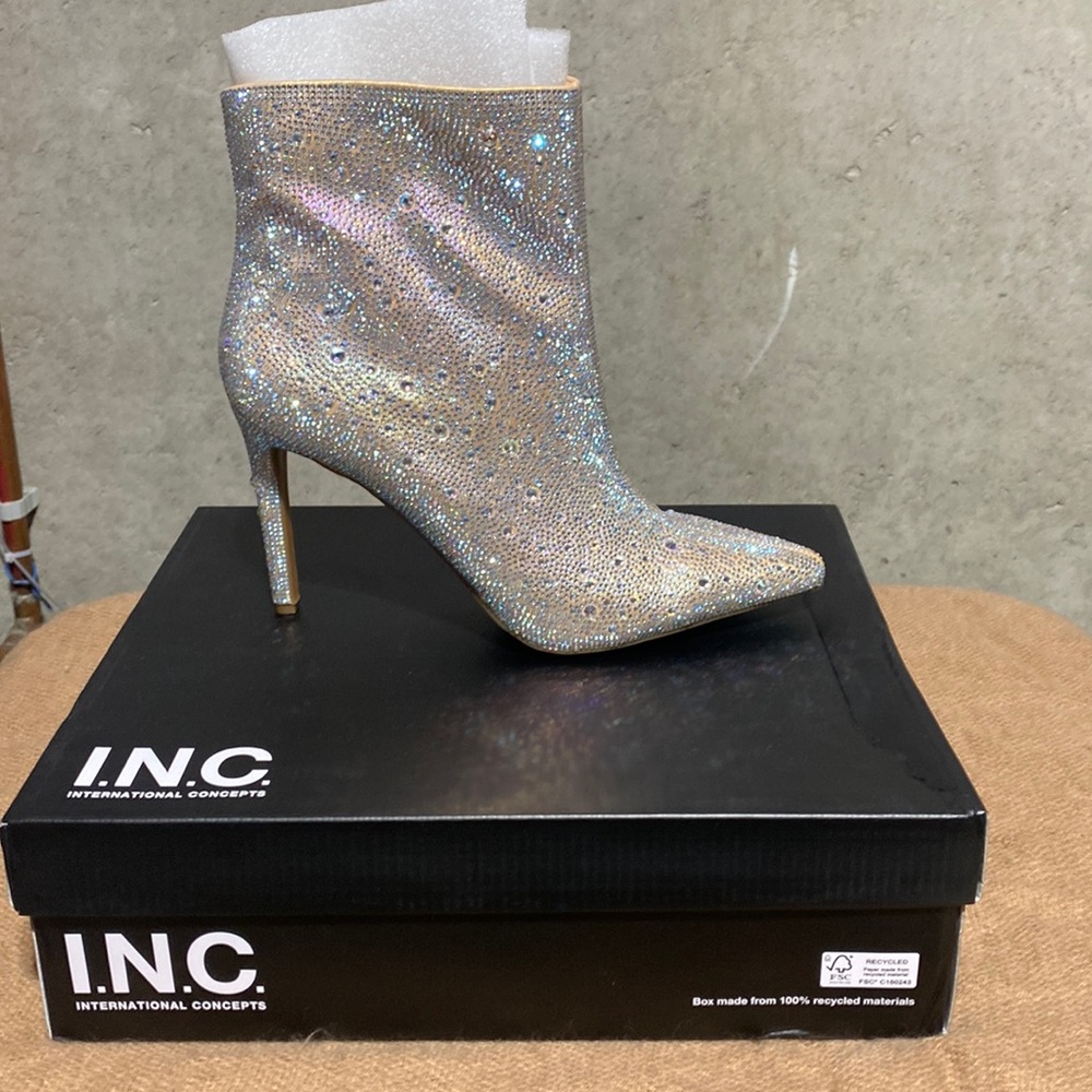 Woman’s size 11 heeled boots with 4 inch heel . Brand new in box .